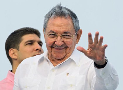 Cuba's President Raul Castro salutes at the May Day parade in Havana's Revolution Square May 1, 2013. REUTERS/Desmond Boylan Cuba's President Raul Castro salutes at the May Day parade in Havana's Revolution Square May 1, 2013. REUTERS/Desmond Boylan