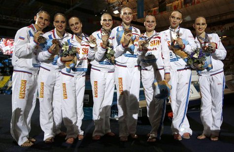 Russia's team show their gold medals after winning the synchronized swimming team free final during the World Swimming Championships at the Russia's team show their gold medals after winning the synchronized swimming team free final during the World Swimming Championships at the