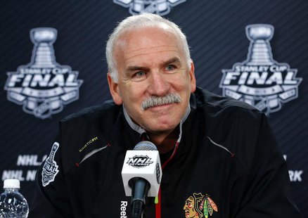 Chicago Blackhawks head coach Joel Quenneville listens to a question from a reporter in Chicago, Illinois, June 21, 2013. REUTERS/Jeff Hayne Chicago Blackhawks head coach Joel Quenneville listens to a question from a reporter in Chicago, Illinois, June 21, 2013. REUTERS/Jeff Hayne