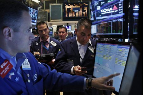Traders work on the floor of the New York Stock Exchange, July 26, 2013. REUTERS/Brendan McDermid Traders work on the floor of the New York Stock Exchange, July 26, 2013. REUTERS/Brendan McDermid