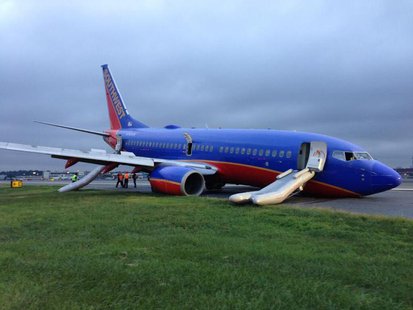 A Southwest Boeing 737 aeroplane sits on the tarmac after passengers were evacuated, at LaGuardia Airport in New York, in this photo courtes A Southwest Boeing 737 aeroplane sits on the tarmac after passengers were evacuated, at LaGuardia Airport in New York, in this photo courtes