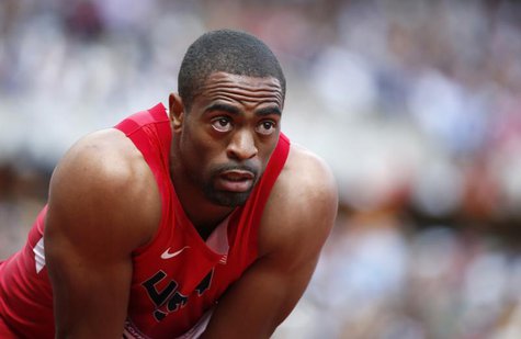 Tyson Gay of the U.S. checks his time after the men's 100m round 1 heats at the London 2012 Olympic Games at the Olympic Stadium August 4, 2 Tyson Gay of the U.S. checks his time after the men's 100m round 1 heats at the London 2012 Olympic Games at the Olympic Stadium August 4, 2