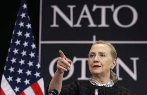 U.S. Secretary of State Hillary Clinton gestures as she addresses a news conference during a NATO foreign ministers meeting at the Alliance U.S. Secretary of State Hillary Clinton gestures as she addresses a news conference during a NATO foreign ministers meeting at the Alliance