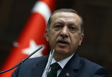 Turkey's Prime Minister Tayyip Erdogan addresses members of parliament from his ruling AK Party (AKP) during a meeting at the Turkish parlia Turkey's Prime Minister Tayyip Erdogan addresses members of parliament from his ruling AK Party (AKP) during a meeting at the Turkish parlia