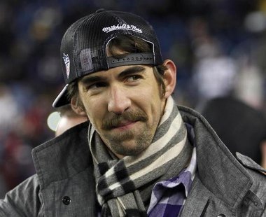 U.S. Olympic gold medal swimmer Michael Phelps attends the NFL AFC Championship football game between the New England Patriots and the Balti U.S. Olympic gold medal swimmer Michael Phelps attends the NFL AFC Championship football game between the New England Patriots and the Balti