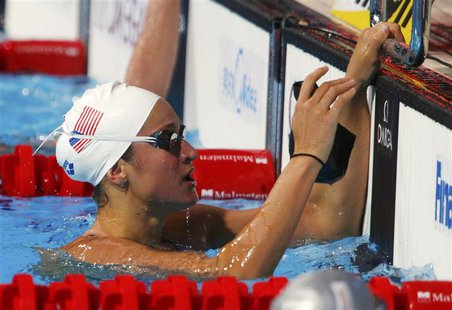 Megan Romano of the U.S. reacts after competing in the women's 4x100m freestyle relay heats during the World Swimming Championships at the S Megan Romano of the U.S. reacts after competing in the women's 4x100m freestyle relay heats during the World Swimming Championships at the S