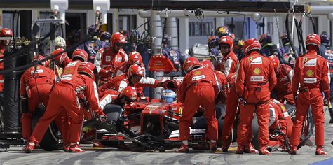 Ferrari Formula One driver Fernando Alonso of Spain makes a pitstop during the Hungarian F1 Grand Prix at the Hungaroring circuit in Mogyoro Ferrari Formula One driver Fernando Alonso of Spain makes a pitstop during the Hungarian F1 Grand Prix at the Hungaroring circuit in Mogyoro