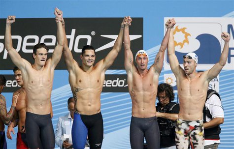 France's Yannick Agnel (L), Florent Manaudou (2nd L), Fabien Gilot (2nd R) and Jeremy Stravius celebrate after winning men's 4x100m freestyl France's Yannick Agnel (L), Florent Manaudou (2nd L), Fabien Gilot (2nd R) and Jeremy Stravius celebrate after winning men's 4x100m freestyl