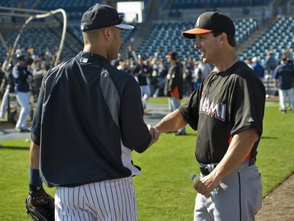 Florida Marlins hitting coach Tino Martinez (R) talks with New York Yankees shortstop Derek Jeter (L) before a MLB spring training baseball Florida Marlins hitting coach Tino Martinez (R) talks with New York Yankees shortstop Derek Jeter (L) before a MLB spring training baseball
