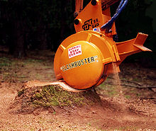 Tree Stump grinder on backhoe Tree Stump grinder on backhoe