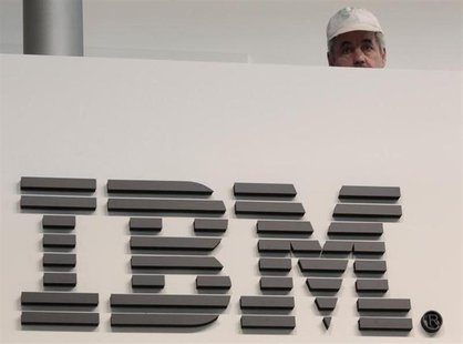 A worker is pictured behind a logo at the IBM stand on the CeBIT computer fair in Hanover February 26, 2011. REUTERS/Tobias Schwarz A worker is pictured behind a logo at the IBM stand on the CeBIT computer fair in Hanover February 26, 2011. REUTERS/Tobias Schwarz