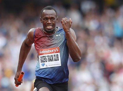 Usain Bolt of Jamaica approaches the finish line after running the final leg for the Racers Track Club to win in the men's 4x100m relay at t Usain Bolt of Jamaica approaches the finish line after running the final leg for the Racers Track Club to win in the men's 4x100m relay at t