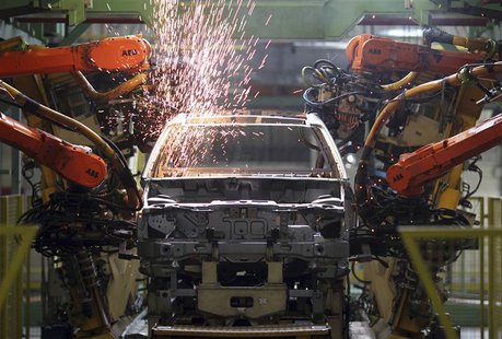 Robots weld cars at the Ford Motor Company's Sao Bernardo do Campo facility in Sao Bernardo do Campo June 14, 2012. REUTERS/Paulo Whitaker Robots weld cars at the Ford Motor Company's Sao Bernardo do Campo facility in Sao Bernardo do Campo June 14, 2012. REUTERS/Paulo Whitaker