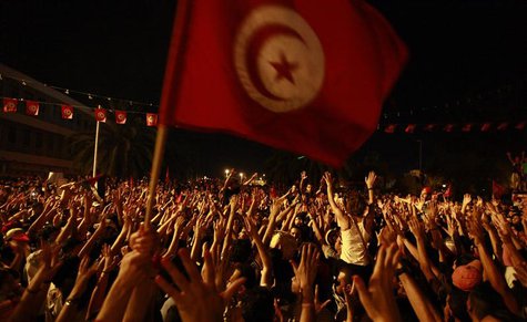 People gather outside the Constituent Assembly headquarters during a protest to demand the ouster of the Islamist-dominated government, in T People gather outside the Constituent Assembly headquarters during a protest to demand the ouster of the Islamist-dominated government, in T
