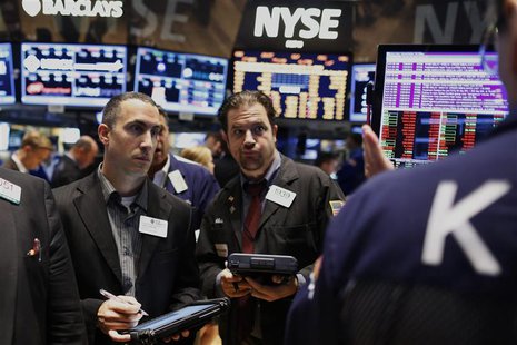 Traders work on the floor of the New York Stock Exchange, July 26, 2013. REUTERS/Brendan McDermid Traders work on the floor of the New York Stock Exchange, July 26, 2013. REUTERS/Brendan McDermid