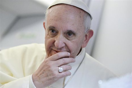 Pope Francis listens to journalists' questions as he flies back Rome following his visit to Brazil July 29, 2013. REUTERS/Luca Zennaro/Pool Pope Francis listens to journalists' questions as he flies back Rome following his visit to Brazil July 29, 2013. REUTERS/Luca Zennaro/Pool