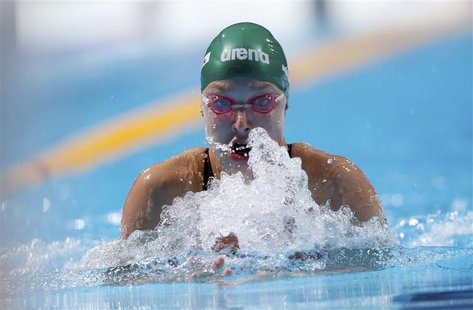 Ruta Meilutyte of Lithuania competes in the women's 100m breaststroke heats during the World Swimming Championships at the Sant Jordi arena Ruta Meilutyte of Lithuania competes in the women's 100m breaststroke heats during the World Swimming Championships at the Sant Jordi arena