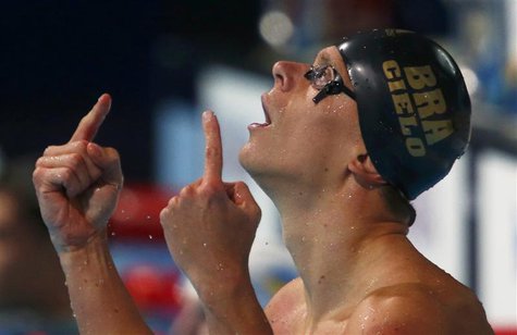 Brazil's Cesar Cielo Filho checks his time after swimming in the men's 50m butterfly final during the World Swimming Championships at the Sa Brazil's Cesar Cielo Filho checks his time after swimming in the men's 50m butterfly final during the World Swimming Championships at the Sa