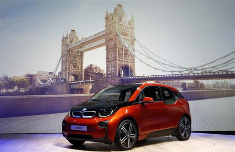 The new BMW i3 electric car is unveiled in front of a projected image of Tower Bridge at a ceremony in London, July 29, 2013. REUTERS/Andrew The new BMW i3 electric car is unveiled in front of a projected image of Tower Bridge at a ceremony in London, July 29, 2013. REUTERS/Andrew