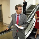 U.S. Senator Rand Paul (R-KY) (L) departs following the weekly Republican caucus luncheon at the U.S. Capitol in Washington June 18, 2013. R U.S. Senator Rand Paul (R-KY) (L) departs following the weekly Republican caucus luncheon at the U.S. Capitol in Washington June 18, 2013. R