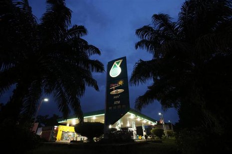 The Petronas logo is seen at one of its petrol outlets in Putrajaya outside Kuala Lumpur December 8, 2012.REUTERS/Bazuki Muhammad The Petronas logo is seen at one of its petrol outlets in Putrajaya outside Kuala Lumpur December 8, 2012.REUTERS/Bazuki Muhammad