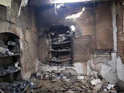 Burnt rooms inside a prison are seen following a Taliban attack in Dera Ismail Khan July 30, 2013. Taliban fighters disguised as police and Burnt rooms inside a prison are seen following a Taliban attack in Dera Ismail Khan July 30, 2013. Taliban fighters disguised as police and