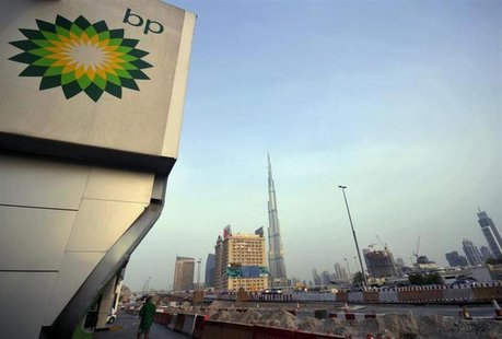 The British Petroleum logo is seen near a petrol station in Dubai with the Burj Khalifa tower in the background July 7, 2010. REUTERS/Jumana The British Petroleum logo is seen near a petrol station in Dubai with the Burj Khalifa tower in the background July 7, 2010. REUTERS/Jumana