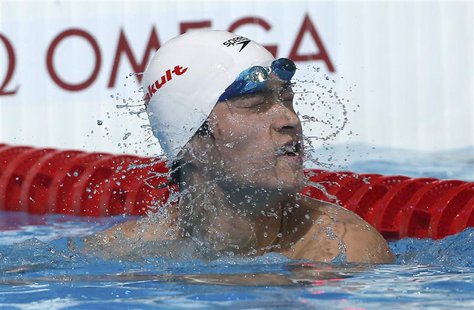 Sun Yang of China reacts after competing in the men's 800m freestyle heats during the World Swimming Championships at the Sant Jordi arena i Sun Yang of China reacts after competing in the men's 800m freestyle heats during the World Swimming Championships at the Sant Jordi arena i