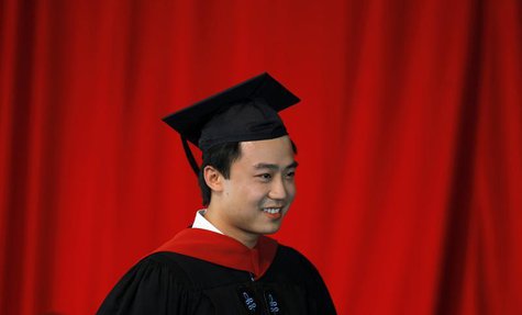 Bo Guagua, son of fallen Chinese politician Bo Xilai, walks offstage after receiving his masters degree in public policy at the John F. Kenn Bo Guagua, son of fallen Chinese politician Bo Xilai, walks offstage after receiving his masters degree in public policy at the John F. Kenn