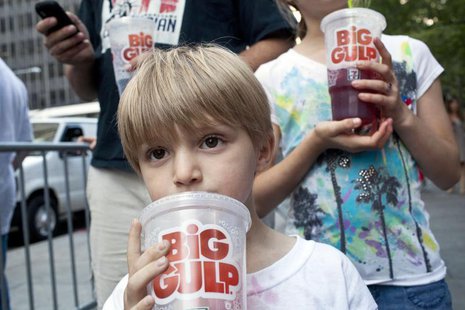 Benjamin Lesczynski, 8, of New York, takes a sip of a "Big Gulp" while protesting the proposed "soda-ban," that New York City Mayor Michael Benjamin Lesczynski, 8, of New York, takes a sip of a "Big Gulp" while protesting the proposed "soda-ban," that New York City Mayor Michael
