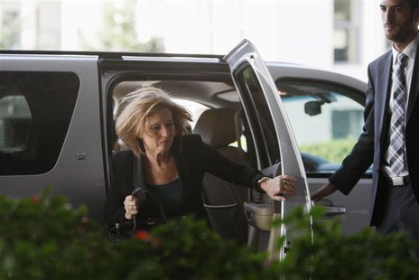 Israel's Justice Minister Tzipi Livni catches herself from falling as she arrives for talks with chief Palestinian negotiator Saeb Erekat an Israel's Justice Minister Tzipi Livni catches herself from falling as she arrives for talks with chief Palestinian negotiator Saeb Erekat an