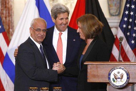 Chief Palestinian negotiator Saeb Erekat (L-R), U.S. Secretary of State John Kerry and Israel's Justice Minister Tzipi Livni shake hands at Chief Palestinian negotiator Saeb Erekat (L-R), U.S. Secretary of State John Kerry and Israel's Justice Minister Tzipi Livni shake hands at
