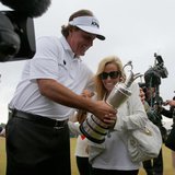 Phil Mickelson of the U.S. (L) holds the Claret Jug as he celebrates with his wife Amy after winning the British Open golf championship at M Phil Mickelson of the U.S. (L) holds the Claret Jug as he celebrates with his wife Amy after winning the British Open golf championship at M