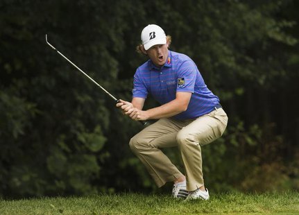 Brandt Snedeker of the U.S. reacts after he hits from the rough from to the twelfth green on his way to winning the tournament during the fi Brandt Snedeker of the U.S. reacts after he hits from the rough from to the twelfth green on his way to winning the tournament during the fi
