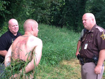 Chief Deputy Clark Cottom left, Suspect Ryan Frazier center, Sheriff Greg Ewing right
photo provided by Vigo County Sheriff Chief Deputy Clark Cottom left, Suspect Ryan Frazier center, Sheriff Greg Ewing right
photo provided by Vigo County Sheriff