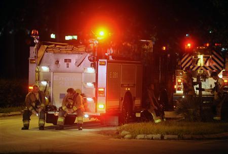 Lake County fire-fighters rest after working to extinguish a fire at the remains of a propane plant after massive explosions at the plant in Tavares, Florida July 30, 2013.
Credit: Reuters/David Manning Lake County fire-fighters rest after working to extinguish a fire at the remains of a propane plant after massive explosions at the plant in Tavares, Florida July 30, 2013.
Credit: Reuters/David Manning