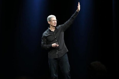 Apple Inc. CEO Tim Cook waves to the crowd during the Apple Worldwide Developers Conference (WWDC) 2013 in San Francisco, California June 10 Apple Inc. CEO Tim Cook waves to the crowd during the Apple Worldwide Developers Conference (WWDC) 2013 in San Francisco, California June 10