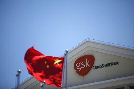 A Chinese national flag flutters in front of a GlaxoSmithKline (GSK) office building in Shanghai, in this July 12, 2013 file photo. The dete A Chinese national flag flutters in front of a GlaxoSmithKline (GSK) office building in Shanghai, in this July 12, 2013 file photo. The dete