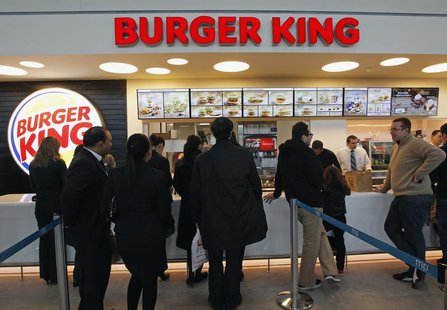 Customers queue up on the opening day of the Burger King restaurant at the Marignane airport hall December 22, 2012. REUTERS/Jean-Paul Pelis Customers queue up on the opening day of the Burger King restaurant at the Marignane airport hall December 22, 2012. REUTERS/Jean-Paul Pelis