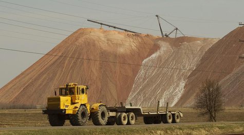 A vehicle drives past a waste heap near the potash mine of joint stock company "Belaruskali" on the outskirts the town of Soligorsk, some 12 A vehicle drives past a waste heap near the potash mine of joint stock company "Belaruskali" on the outskirts the town of Soligorsk, some 12