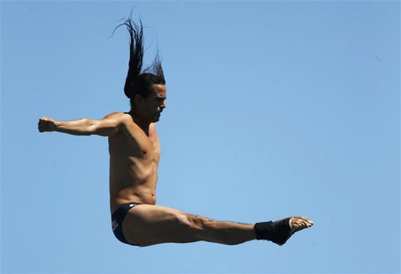 Colombia's Orlando Duque performs a dive in round 1 of the men's 27m high diving during the World Swimming Championships at Moll de la Fusta Colombia's Orlando Duque performs a dive in round 1 of the men's 27m high diving during the World Swimming Championships at Moll de la Fusta