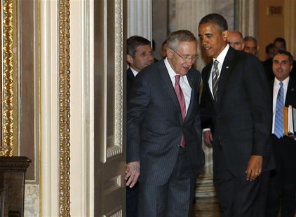 U.S. President Barack Obama talks with U.S. Senate Majority Leader Harry Reid before walking into a meeting with U.S. Senate Democrats on Ca U.S. President Barack Obama talks with U.S. Senate Majority Leader Harry Reid before walking into a meeting with U.S. Senate Democrats on Ca