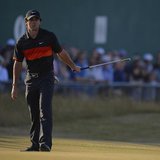 Rory McIlroy of Northern Ireland watches his putt on the 18th green during his second round of the British Open golf Championship at Muirfie Rory McIlroy of Northern Ireland watches his putt on the 18th green during his second round of the British Open golf Championship at Muirfie