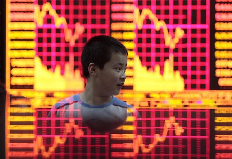 A boy plays at a brokerage house in Shanghai in this July 30, 2009 file photo. REUTERS/Aly Song/Files A boy plays at a brokerage house in Shanghai in this July 30, 2009 file photo. REUTERS/Aly Song/Files
