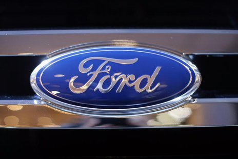 A Ford logo is seen on a car during a press preview at the 2013 New York International Auto Show in New York, March 28, 2013. REUTERS/Mike S A Ford logo is seen on a car during a press preview at the 2013 New York International Auto Show in New York, March 28, 2013. REUTERS/Mike S