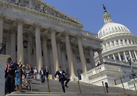 Members of the House of Representatives and their staffs leave the U.S. Capitol, adjourning after their final vote of the day in Washington Members of the House of Representatives and their staffs leave the U.S. Capitol, adjourning after their final vote of the day in Washington