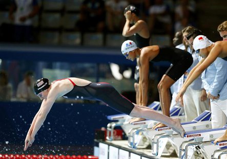 Missy Franklin of the U.S. dives in the women's 4x200m freestyle final during the World Swimming Championships at the Sant Jordi arena in Ba Missy Franklin of the U.S. dives in the women's 4x200m freestyle final during the World Swimming Championships at the Sant Jordi arena in Ba