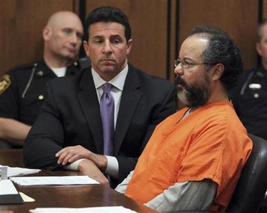 Ariel Castro (R), 53, sits in the court room next to his attorney Craig Weintraub in Cleveland, Ohio July 26, 2013.
Credit: Reuters/Aaron Josefczyk Ariel Castro (R), 53, sits in the court room next to his attorney Craig Weintraub in Cleveland, Ohio July 26, 2013.
Credit: Reuters/Aaron Josefczyk