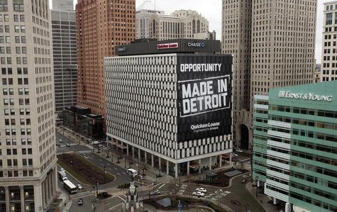 A view of downtown Detroit is seen looking south on Woodward Avenue including one of several buildings (with the Made In Detroit banner) rec A view of downtown Detroit is seen looking south on Woodward Avenue including one of several buildings (with the Made In Detroit banner) rec