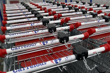 View of shopping trolleys on a parking lot at the Carrefour hypermarket in Rosny sous Bois, east of Paris, April 30, 2013. REUTERS/Charles P View of shopping trolleys on a parking lot at the Carrefour hypermarket in Rosny sous Bois, east of Paris, April 30, 2013. REUTERS/Charles P